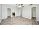 Spacious bedroom with vinyl flooring and ceiling fan at 11301 Hudson Hills Ln, Riverview, FL 33579