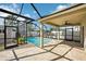 Enjoy the Florida lifestyle in this screened-in pool with covered patio and yard at 11301 Hudson Hills Ln, Riverview, FL 33579
