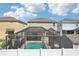 Aerial shot featuring houses with screened-in pools and tidy backyards in a suburban setting at 11301 Hudson Hills Ln, Riverview, FL 33579