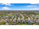Aerial view showing the neighborhood's home styles, ponds, and proximity to community parks at 11822 Crawford Parrish Ln, Parrish, FL 34219