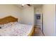 Bedroom featuring a beautifully crafted bed and a soothing ambiance for restful nights at 11822 Crawford Parrish Ln, Parrish, FL 34219
