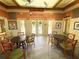 Welcoming community center with tables, chairs, and a view of the pool at 11822 Crawford Parrish Ln, Parrish, FL 34219