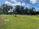Community dog park with various play structures and green space for pets to enjoy at 11822 Crawford Parrish Ln, Parrish, FL 34219