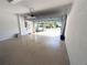 Spacious two-car garage ready for your vehicles and storage needs, with easy access to the outdoors at 11822 Crawford Parrish Ln, Parrish, FL 34219