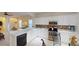 Kitchen with white countertops, stainless appliances, and breakfast nook at 11822 Crawford Parrish Ln, Parrish, FL 34219