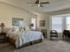 Primary bedroom featuring a ceiling fan, neutral colors, and lots of natural light at 1258 Clays Trl # 1258, Oldsmar, FL 34677