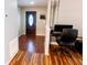 Entryway with wood flooring leads past office nook at 13116 Sheridan Dr, Hudson, FL 34667
