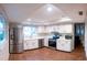 Bright kitchen features modern stainless steel appliances and ample cabinet space at 13116 Sheridan Dr, Hudson, FL 34667