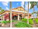 Bahama Bar with outdoor seating, tropical landscaping, and bright orange accents, perfect for resort-style community living at 13823 Messina Loop # 204, Bradenton, FL 34211