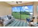 Relaxing balcony with comfortable seating and scenic views of the golf course at 13823 Messina Loop # 204, Bradenton, FL 34211