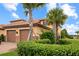Exterior view showcasing the well-maintained landscaping and architecture at 13823 Messina Loop # 204, Bradenton, FL 34211
