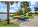 Scenic view of a lake with canoes available for residents to enjoy a tranquil paddle at 13823 Messina Loop # 204, Bradenton, FL 34211