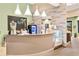Cafe counter with decorative textured wall and pendant lighting offering drinks and dessert options at 13823 Messina Loop # 204, Bradenton, FL 34211