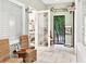 Welcoming salon entrance features frosted doors, salon signage and comfortable waiting area seating at 13823 Messina Loop # 204, Bradenton, FL 34211