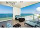 Relaxing balcony with seating and panoramic ocean views at 1390 Gulf Blvd # Ph 2, Clearwater Beach, FL 33767