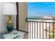 Balcony view of beautiful beach and city skyline, featuring clear blue skies at 1390 Gulf Blvd # Ph 2, Clearwater Beach, FL 33767