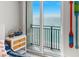 Bedroom view of the beach and ocean through sliding glass doors to balcony at 1390 Gulf Blvd # Ph 2, Clearwater Beach, FL 33767