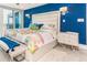 Brightly lit main bedroom with king bed, contemporary furnishings, access to balcony and views of the ocean at 1390 Gulf Blvd # Ph 2, Clearwater Beach, FL 33767