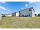Exterior view of backyard and home at 14153 Arbor Pines Dr, Riverview, FL 33579
