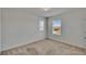 Bedroom with neutral walls, carpeted floors and plenty of natural light at 14153 Arbor Pines Dr, Riverview, FL 33579