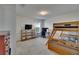 Comfortable bedroom with a wooden bunk bed, desk and plenty of natural light at 14153 Arbor Pines Dr, Riverview, FL 33579