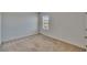 Bedroom features neutral walls, carpeted floors and natural light at 14153 Arbor Pines Dr, Riverview, FL 33579