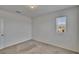 Bedroom featuring neutral colored walls, carpet flooring and natural light at 14153 Arbor Pines Dr, Riverview, FL 33579