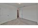 Bedroom with neutral colored walls, carpet flooring and dual closets at 14153 Arbor Pines Dr, Riverview, FL 33579