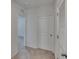 Hallway featuring carpet flooring with access to doorways at 14153 Arbor Pines Dr, Riverview, FL 33579