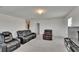 A spacious living room with comfortable seating and neutral carpet at 14153 Arbor Pines Dr, Riverview, FL 33579