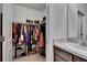 Well-organized walk-in closet with ample shelving and hanging space at 14153 Arbor Pines Dr, Riverview, FL 33579