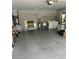 A spacious two-car garage with washer and dryer hookups at 1660 Caledonia Dr, Palm Harbor, FL 34684