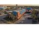 Wide aerial view of the building showing its unique architectural details, blue roof, and surrounding neighborhood at 17035 Gulf Blvd # 202, North Redington Beach, FL 33708