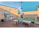Community rooftop deck with grill, lounge seating, and beautiful building views at 17035 Gulf Blvd # 202, North Redington Beach, FL 33708