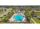 Overhead view highlighting the community pool with lounge chairs and cabana areas at 1706 Trailwater St, Ruskin, FL 33570