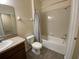 Clean bathroom features a shower-tub combination and a vanity at 1706 Trailwater St, Ruskin, FL 33570