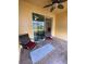 Cozy patio with ceiling fan and sliding glass door at 1706 Trailwater St, Ruskin, FL 33570
