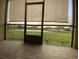 Screened patio view overlooking the pond and lush backyard at 1706 Trailwater St, Ruskin, FL 33570