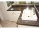 Bathroom featuring a sink, vanity, and cabinets, offering ample storage at 19029 Us Highway 19 N # 2-12, Clearwater, FL 33764
