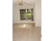 Bright bedroom with neutral walls and large window offering natural light at 19029 Us Highway 19 N # 2-12, Clearwater, FL 33764