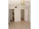 Spacious bedroom offering access to the bathroom and hallway at 19029 Us Highway 19 N # 2-12, Clearwater, FL 33764
