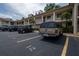 Exterior of building with parking lot and landscaping at 19029 Us Highway 19 N # 2-12, Clearwater, FL 33764