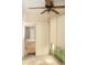 Cozy sunroom with tile floors and vertical blinds at 19029 Us Highway 19 N # 2-12, Clearwater, FL 33764