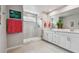 Spa-like bathroom features a glass-enclosed shower and double sink vanity at 19398 Great Intention Way, Lutz, FL 33558