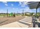 A community playground with modern equipment and ample seating, creating a perfect spot for families at 19398 Great Intention Way, Lutz, FL 33558