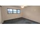 Inviting bedroom featuring soft carpet, neutral walls, and a ceiling fan at 2402 Ecuadorian Way # 20, Clearwater, FL 33763