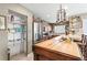 Well-organized kitchen with stainless steel appliances, custom cabinetry, and walk-in pantry at 2490 E Vina Del Mar Blvd, St Pete Beach, FL 33706