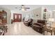 Inviting living area with tile flooring, double-door entry, and tastefully decorated furnishings at 2490 E Vina Del Mar Blvd, St Pete Beach, FL 33706