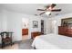 Main bedroom featuring neutral walls, carpeted floor, and ensuite bathroom at 2490 E Vina Del Mar Blvd, St Pete Beach, FL 33706