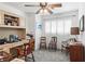 Home office featuring a built-in desk, ample natural light, and neutral decor at 2490 E Vina Del Mar Blvd, St Pete Beach, FL 33706